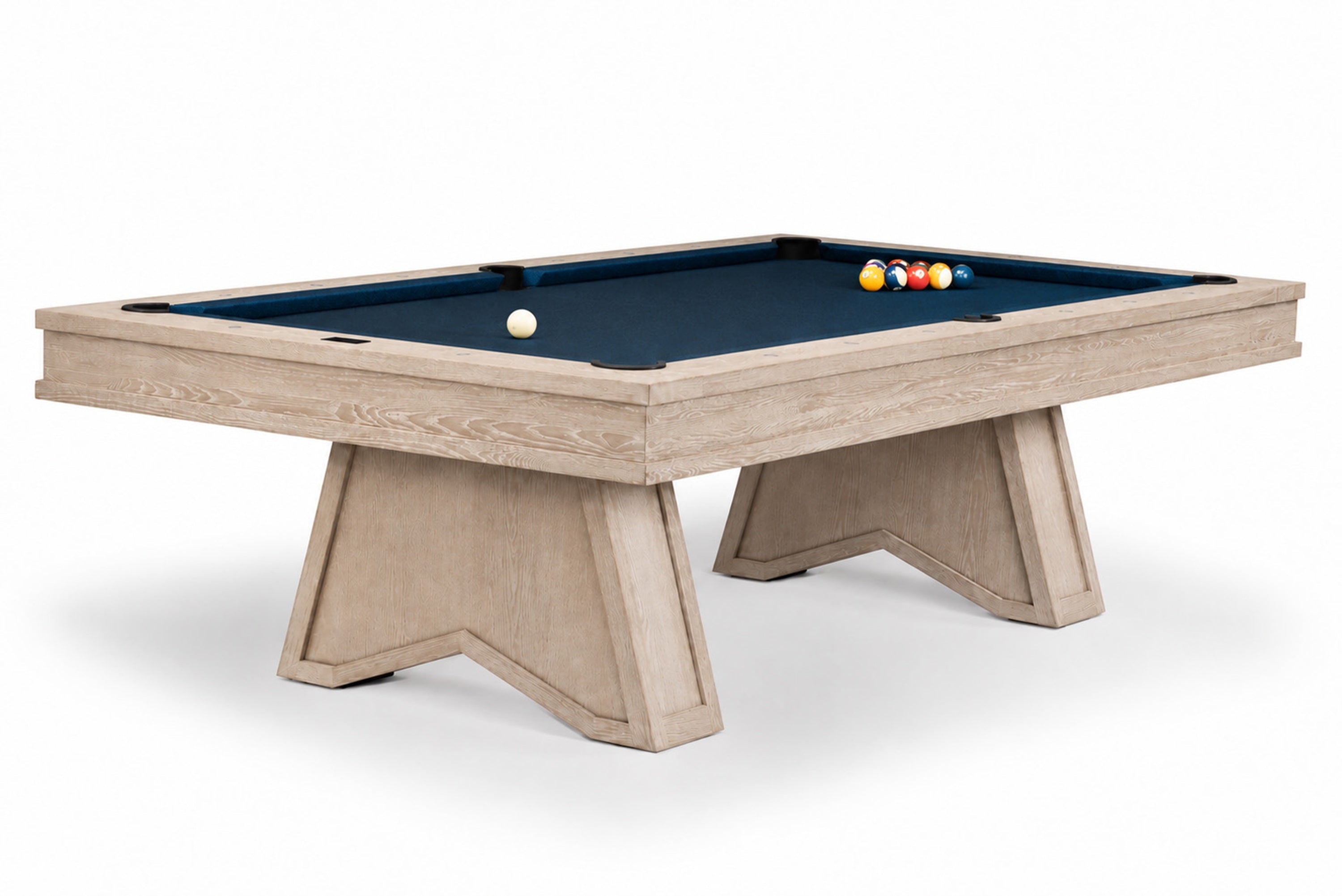 A modern pool table with a light beige wood-grain frame and a dark navy blue felt surface, shown on a clean white background.