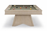 A modern pool table with a light oak wood frame and a dark green felt surface, shown on a clean white background with several billiard balls scattered on the table.